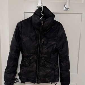 SAM. Women's subtle camo print, black and grey puffer jacket. Detachable hood